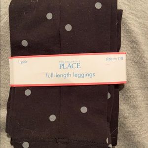 Black polka dot leggings